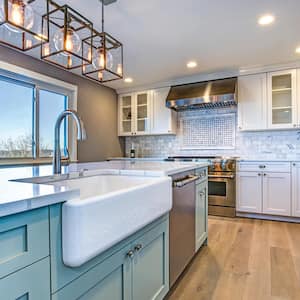 White farmhouse sink in a modern kitchen