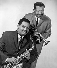 Cannonball (holding a King Super 20 "Silversonic" alto saxophone) with brother Nat Adderley in 1966