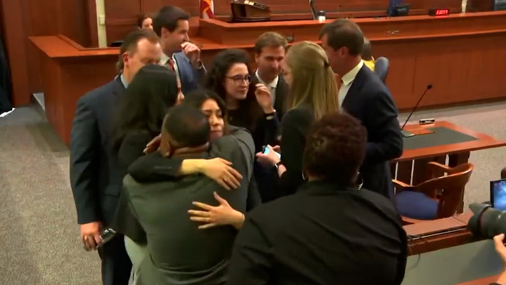 Johnny Depp’s legal team hug and celebrate after winning defamation case