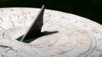 A sundial casting a shadow.