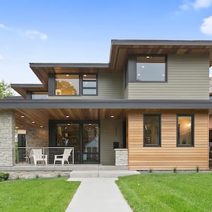 Modern home with stone and natural materials siding