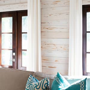 A beach style living room with shiplap