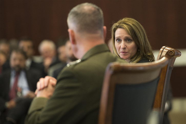 Kathleen Hicks speaks at an event with Marine Corps Gen. Joe Dunford.