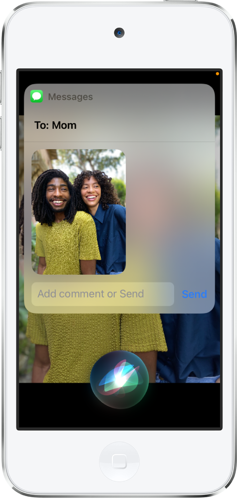 The Photos app is open with a photo of two people. On top of the photo is a message addressed to Mom, which includes the same photo. Siri is at the bottom of the screen.