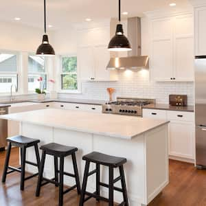 kitchen with white cabinets and a variety of black hardware