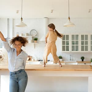 Mother and daughter in kitchen