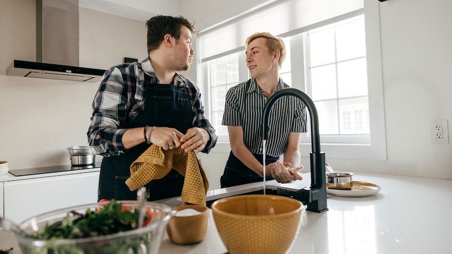 Young couple spending time together in the kitchen