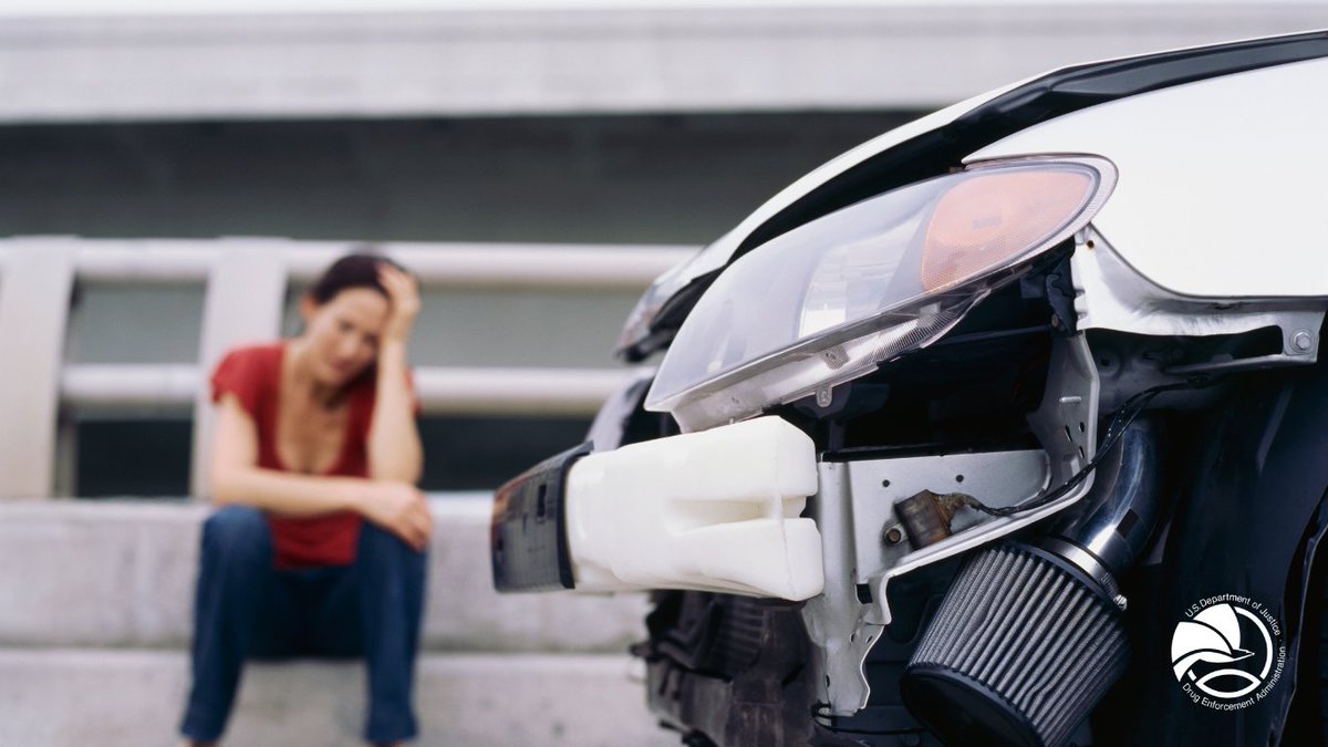 Graphic of woman holding her head and sitting on sidewalk after a car accident.