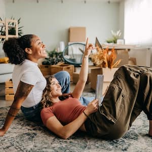 A couple furnishing their new apartment together