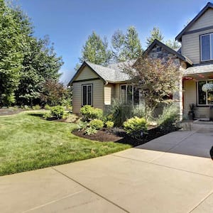 Exterior of house with concrete walkway