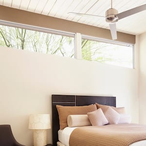 Sunny bedroom with ceiling fain