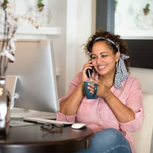 woman talking on house phone