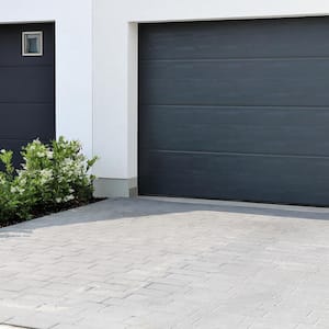 Two modern garage doors in a residential district