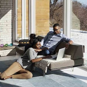 couple at home sitting in the living room