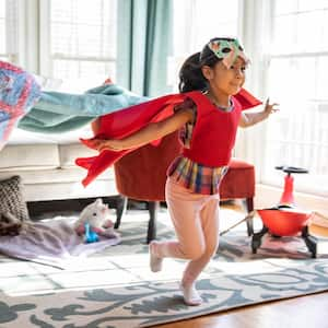 Child playing in homemade costume