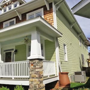 Green two-story house