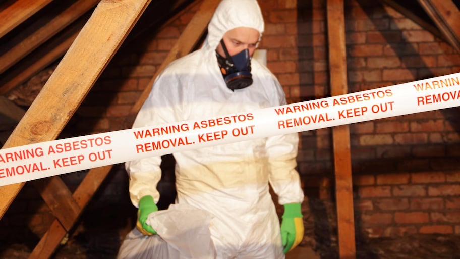 Man removing asbestos