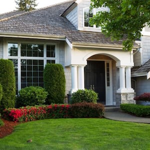 The exterior of a house with a beautiful garden