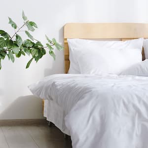 A bed with white sheets