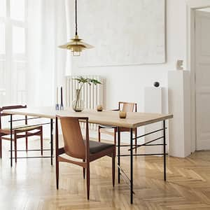 The interior of an eclectic dining room on a sunny day