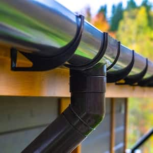 Holder gutter drainage system on the roof