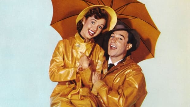 A poster for Stanley Donen's 1952 comedy 'Singin' in the Rain' starring Gene Kelly and Debbie Reynolds. (Credit: Movie Poster Image Art/Getty Images)