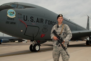 U.S. Air Force Airman 1st Class Joseph T. Nenadich, with the 121st Security Forces Squadron, poses with a KC-135 Stratotanker June 7, 2015 at Rickenbacker Air National Guard Base, Ohio. Nenadich, a 21-year-old from Youngstown, joined the Air National Guard in 2013. (U.S. Air National Guard photo by Tech. Sgt. Zachary Wintgens/Released)