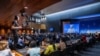 FILE - A general view of the room during the speech of Director-General of the World Trade Organization (WTO) Ngozi Okonjo-Iweala at the opening of the 12th Ministerial Conference, at WTO headquarters in Geneva, Switzerland, June 12, 2022.