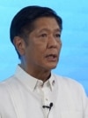 FILE - Ferdinand Marcos Jr. speaks to reporters on May 11, 2022, the same day he claimed victory in the Philippines' presidential election. His national security adviser-designate wants to stop the labeling and harassment of government critics.