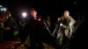 Federal police officers arrive at the pier with recovered human remains found during a search for Indigenous expert Bruno Pereira of Brazil and freelance reporter Dom Phillips of Britain, in Atalaia do Norte, Amazonas state, Brazil, June 15, 2022.