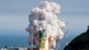 In this photo provided by Korea Aerospace Research Institute, the Nuri rocket, the first domestically produced space rocket, lifts off from a launch pad at the Naro Space Center in Goheung, South Korea, June 21, 2022. (Korea Aerospace Research Institute via AP)