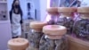 Jars of dried and cured cannabis buds sit on display at the Chopaka cannabis shop in Bangkok, Thailand.