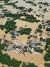 This aerial photo shows a flooded area after heavy rains in Yingde, Qingyuan city, in China's southern Guangdong province, June 23, 2022. 