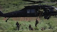Bulgarian and Ukrainian Special Operations Forces fast-rope from a U.S. Army MH-60M Blackhawk helicopter assigned to the 160th Special Operations Aviation Regiment (Airborne) near Yambol, Bulgaria June 17, 2019, as part of Exercise Trojan Footprint 19. Trojan Footprint is an annual U.S. Special Operations Command Europe-led exercise that incorporates Allied and partner special operations forces, this year's exercise brought together 1400 SOF from ten nations for training over land, sea and air across Bulgaria, Hungary, Romania and the Black Sea.  (U.S. Army photo by Spc. Monique O’Neill)