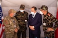 U.S. Air Force Lt. Col. Todd Bingham, commander of the U.S. military humanitarian civic assistance portion of African Lion 2021, meets with Governor Hassan Khalil, civic leader of Tiznit Province at the Military Medical Surgical Field hospital in Tafraoute, Morocco on June 10, 2021 during AL21. African Lion 2021 is U.S. Africa Command’s largest, premier, joint, annual exercise hosted by Morocco, Tunisia, and Senegal, 7-18 June. More than 7,000 participants from nine nations and NATO train together with a focus on enhancing readiness for us and partner nation forces. AL21 is multi-domain, null-component, and multinational exercise, which employs a full array of mission capabilities with the goal to strengthen interoperability among participants. (U.S. Air National Guard photo by Tech. Sgt. Colton Elliott).