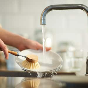 Washing up in kitchen sink