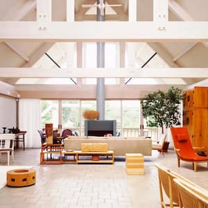 A lightfilled house with vaulted ceiling and eclectic furniture