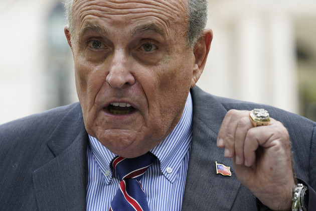 Former New York City mayor Rudy Giuliani speaks during a news conference.