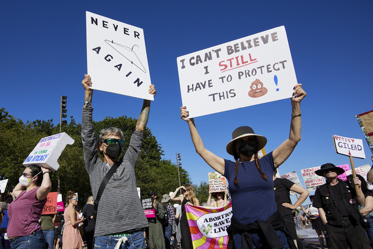 People protest against the Supreme Court ruling overturning Roe v. Wade.