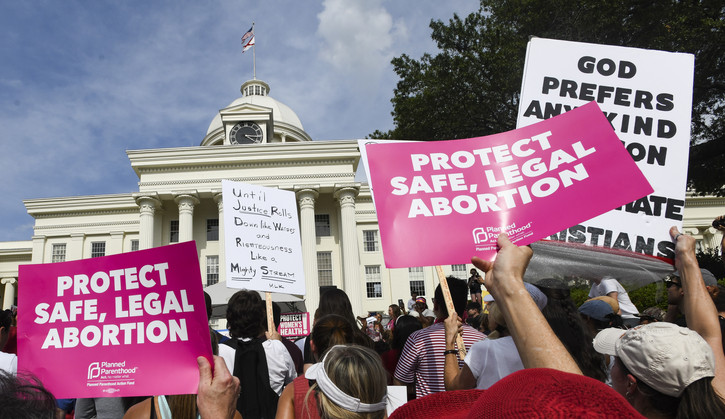 Protestors participate in a rally.