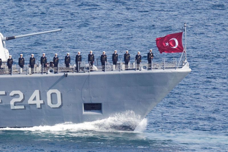 Sailors standing on the deck of a warship at a parade during the Turkish International Ceremony at Mehmetcik Abidesi Martyrs Memorial near Seddulbahir Turkey on April 24, 2015.