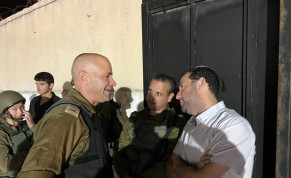   IDF Samaria Regional Brigade commander Col. Roi Zweig talking with Samaria Regional Council head Yossi Dagan, just prior to the shooting.