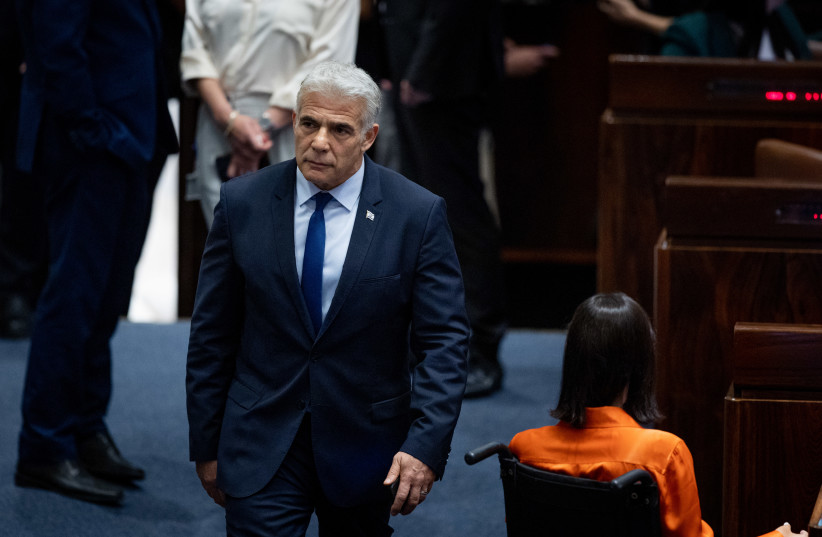  Minister of Foreign Affairs Yair Lapid seen during a plenum session in the assembly hall of the Israeli parliament, in Jerusalem on June 20, 2022. (credit: YONATAN SINDEL/FLASH90)