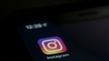 The Instagram app is displayed on a computer on Aug. 23, 2019, in New York. Over the last day, several Instagram accounts run by abortion rights advocacy groups discovered that some of their content mentioning abortion has been hidden from public view or labeled "sensitive."