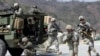 FILE - U.S. Army soldiers from the 25th Infantry Division's 2nd Stryker Brigade Combat Team and South Korean soldiers take part in an annual joint military exercise at the Rodriquez Multi-Purpose Range Complex in Pocheon, north of Seoul, South Korea.