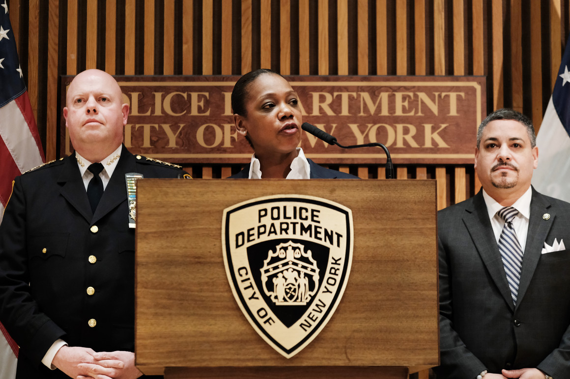 Keechant Sewell speaks at a NYPD podium.
