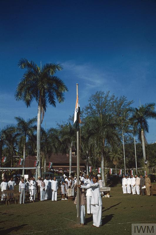 Indian Independence is celebrated in Malaya shortly before the start of the Malayan Emergency. The Indian flag is raised at Klang, Selangor.