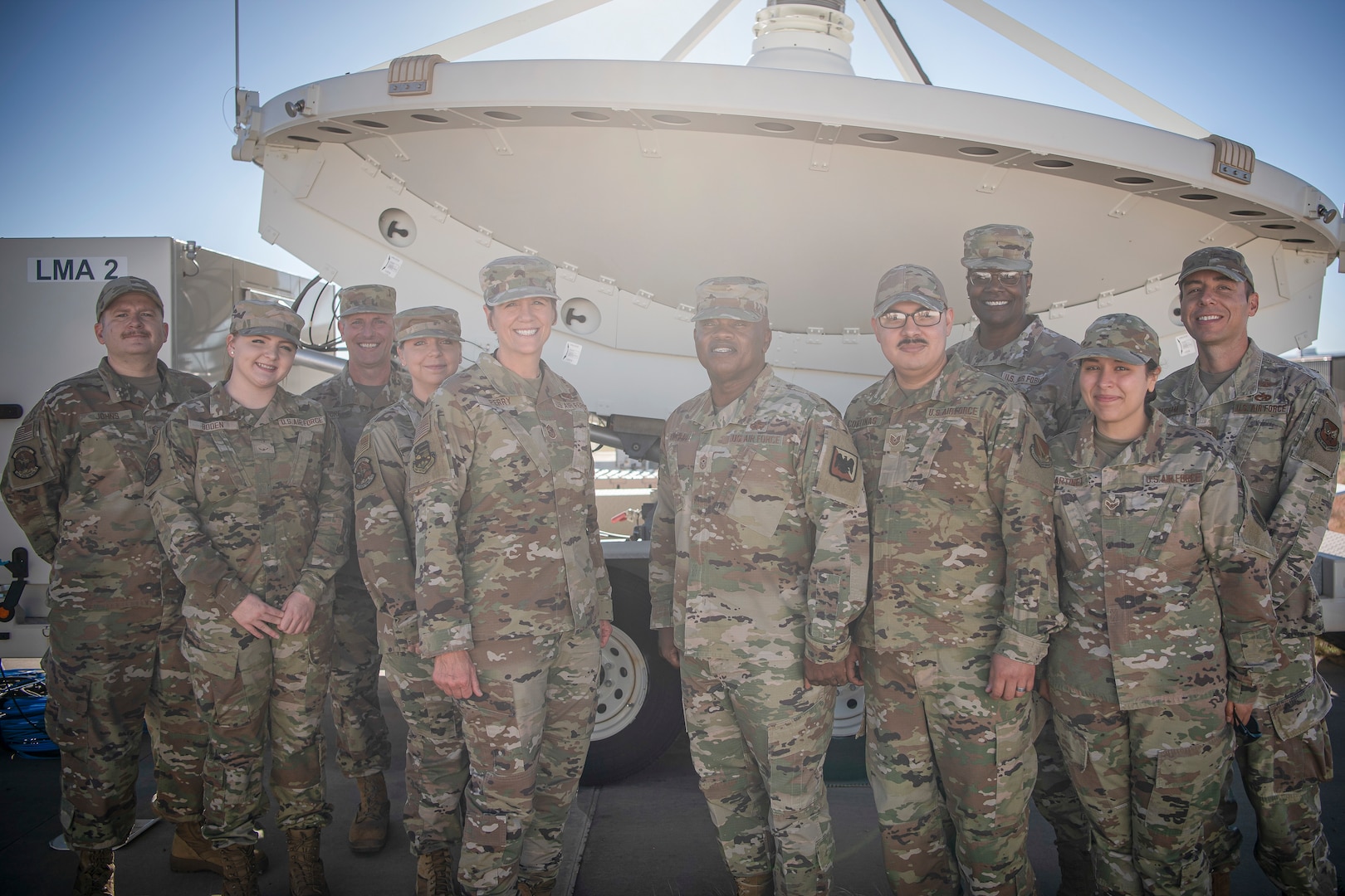 Senior Enlisted Advisor Tony Whitehead, center right, the SEA to the chief of the National Guard Bureau, stands with Command Chief Master Sgt. Lisa Perry, the Colorado National Guard’s command senior enlisted leader, and members of the Colorado Guard’s 138th Space Control Squadron on Schriever Space Force Base, Colorado, June 28, 2022. Whitehead visited Colorado Guard space and missile defense units in Colorado Springs to see how National Guard members are contributing to these expanding domains.