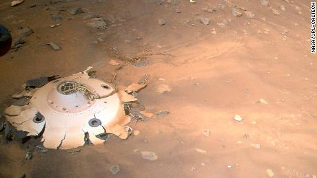 April 27, 2022

This image of Perseverance&#39;s backshell and parachute was collected from an altitude of 26 feet (8 meters) by the NASA&#39;s Ingenuity Mars Helicopter during its 26th flight on Mars on April 19, 2022.

The parachute and cone-shaped backshell protected the rover during its fiery descent toward the Martian surface on Feb. 18, 2021. Engineers working on the Mars Sample Return program requested images be taken of the components from an aerial perspective because they may provide insight into the components&#39; performance during the rover&#39;s entry, descent, and landing.

The Ingenuity Mars Helicopter was built by NASA&#39;s Jet Propulsion Laboratory in Southern California, which also manages the project for NASA Headquarters. It is supported by NASA&#39;s Science Mission Directorate. NASA&#39;s Ames Research Center in California&#39;s Silicon Valley, and NASA&#39;s Langley Research Center in Hampton, Virginia, provided significant flight performance analysis and technical assistance during Ingenuity&#39;s development. AeroVironment Inc., Qualcomm, and SolAero also provided design assistance and major vehicle components. Lockheed Martin Space designed and manufactured the Mars Helicopter Delivery System.