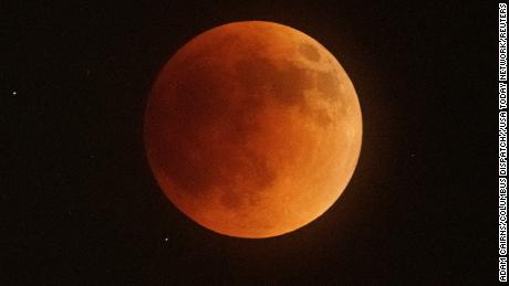 The Super Flower Blood Moon lunar eclipse occurs over Columbus, Ohio on May 15, 2022. May&#39;s full moon is known as the flower moon, and it temporarily turned red while it was in the earth&#39;s shadow.Super Flower Blood Moon Lunar Eclipse